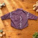 Purple Kids Shirt Flat Lay with Toys.webp