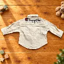 Kids’ Champion Shirt Flatlay with Toys.webp