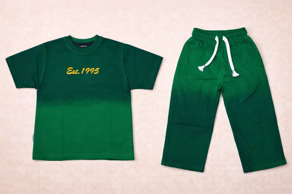 Green two-piece set flat lay.webp